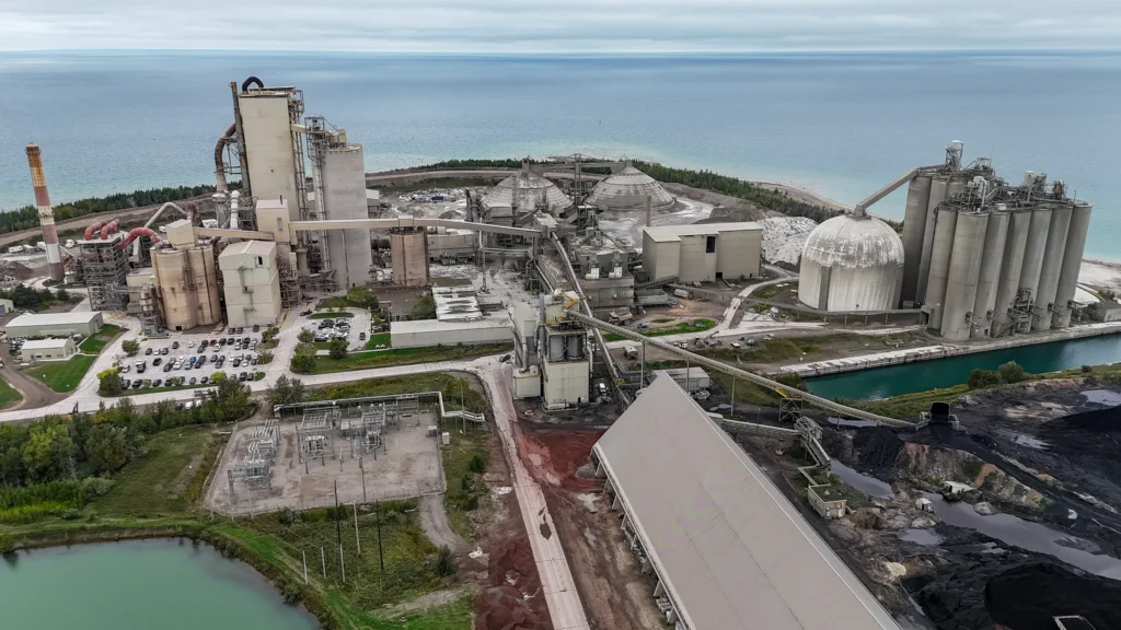 Plant Community Relations - aerial view of the Charlevoix cement plant on the Lake Michigan shore