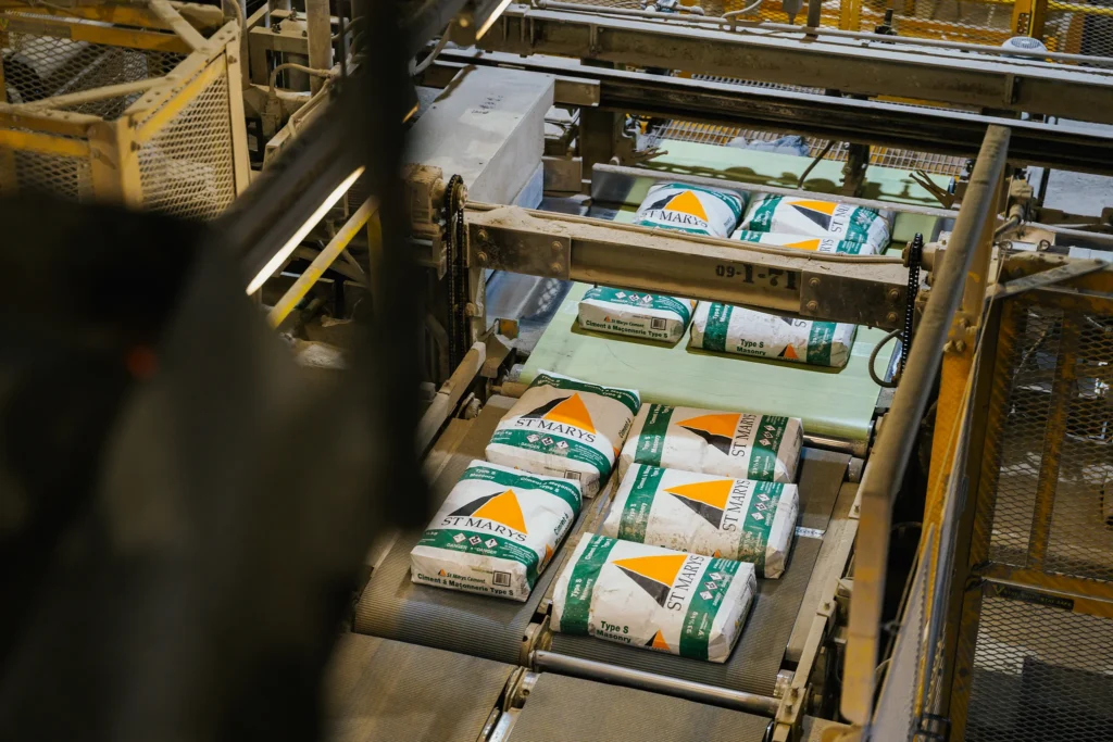 Cement Supplier - bags of St Marys cement moving along the packing line conveyor