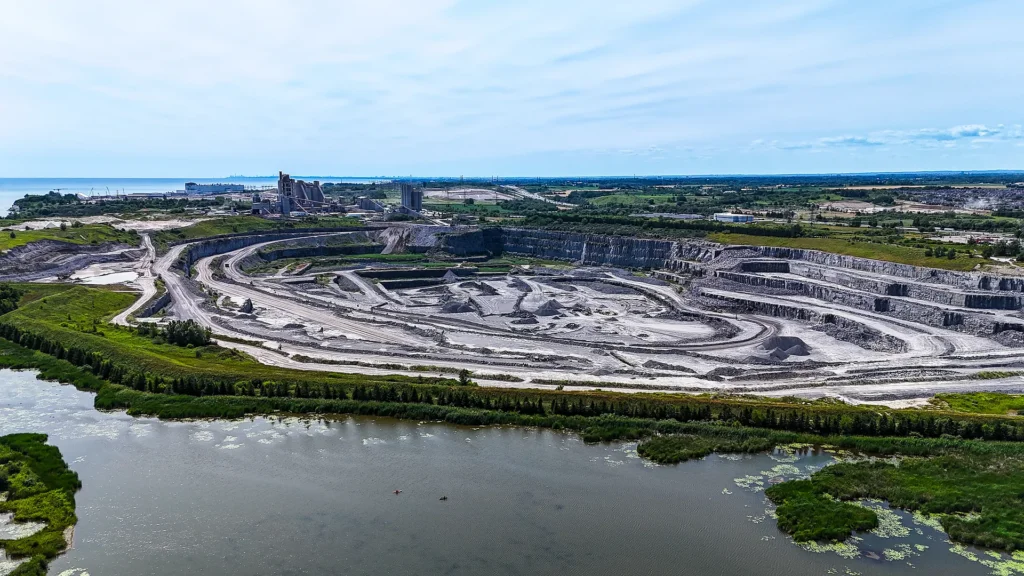Bowmanville Cement Plant - aerial view of the quarry beside a marsh and a large lake