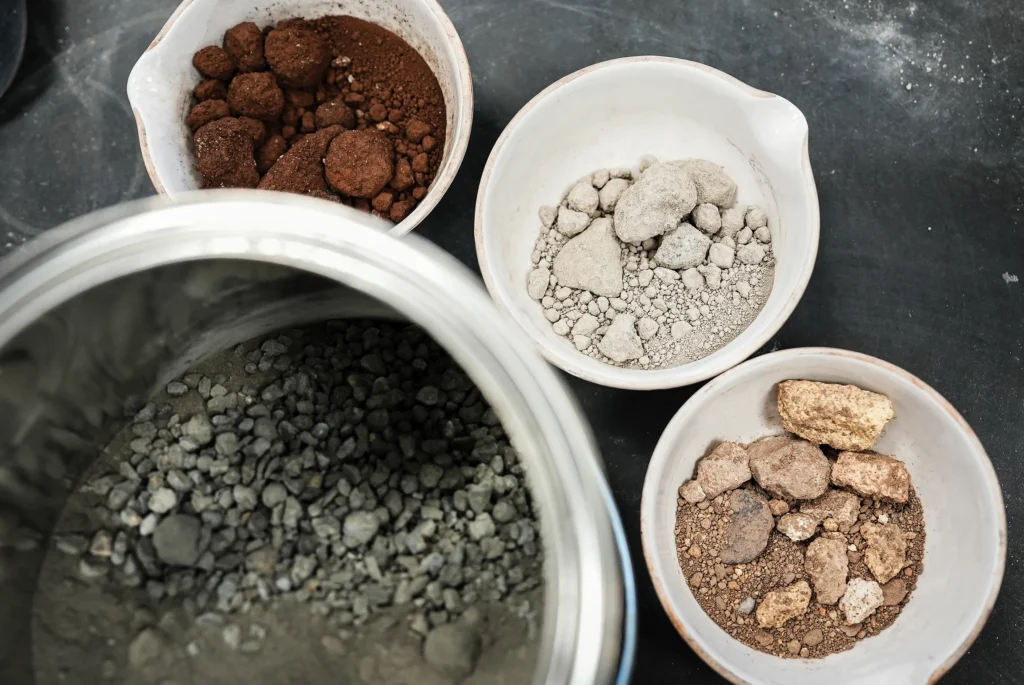 St Marys Cement EPDs - raw material samples in lab dishes, including crushed stone and clay